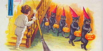 Tarjeta antigua de Halloween con gatos negros